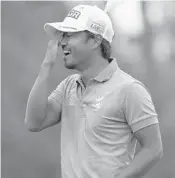  ?? STREETER LECKA/GETTY IMAGES ?? Satoshi Kodaira of Japan reacts after making his birdie putt on the third playoff hole to win the 2018 RBC Heritage.