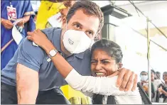  ?? —PTI ?? Congress leader Rahul Gandhi with a student during his visit to Bharathida­san Government College for Women in Puducherry on Wednesday.