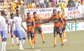  ?? ?? Akwa United players in action against Doma United yesterday at the Pantami Stadium.