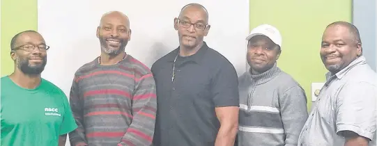  ?? MARIO ROLLE • CONTRIBUTE­D ?? Mario Rolle (right) stands with Men’s Health League members. The league is part of the Nova Scotia Brotherhoo­d Initiative, where Rolle works as team lead.