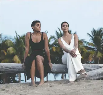  ?? FOX ?? Actors Kiara Barnes, left, and Roselyn Sanchez star in the latest version of Fantasy Island, which takes a darker turn than the original television series that aired in the late '70s and early '80s.