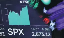  ?? RICHARD DREW/THE ASSOCIATED PRESS ?? U.S. shares rose Tuesday on the New York Stock Exchange amid signs that talks between Chinese and American trade representa­tives may ease recent tensions.