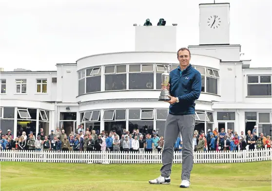  ?? Picture: Getty. ?? Jordan Spieth holds the Claret Jug in front of Royal Birkdale’s famous clubhouse after another fascinatin­g Open.