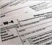  ?? PATRICK SISON / AP 2020 ?? Following federal and Ohio extensions, many local cities have extended filing deadlines for tax returns.