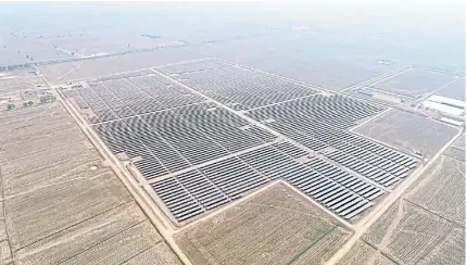  ?? ?? A bird’s-eye view of B.Grimm Power’s solar farm in Cambodia.