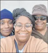  ?? Dana Jackson and Iris Alexander ?? Sisters Dana Jackson and Iris Alexander, center, with their mother, Gwendolyn Alexander, in a family snapshot.