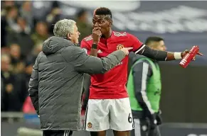  ?? GETTY IMAGES ?? Paul Pogba and his then Manchester United coach Jose Mourinho have a heated discussion during a Premier League clash last year.