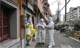  ?? Photograph: Héctor Retamal/AFP/Getty Images ?? China is launching a staged lockdown of Shanghai in an effort to curb the spread of the country’s worst Covid outbreak since 2020.