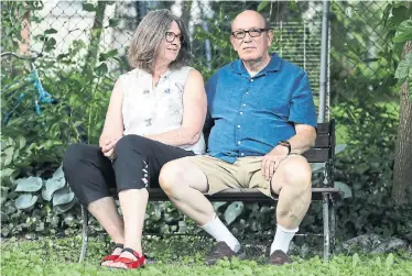  ?? RICHARD LAUTENS TORONTO STAR ?? Debra and Michael Schneider took no chances with their trip to Calgary and bought medical insurance. The bank assured Michael that his credit card included COVID-19 coverage, but a call to the insurer revealed that was incorrect.