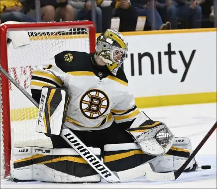  ?? Ap ?? boston bruins goaltender Jeremy swayman stops a shot by nashville Predators center Philip tomasino during thursday’s game.