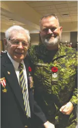  ??  ?? Capitalcar­e Kipnes Centre for Veterans resident Pete Dutka with Sergeant Jason Tabbernor, member of the Royal Canadian Corps of Signals at the Veterans Dinner,
CFB Edmonton, Nov. 1, 2019.