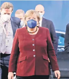  ?? — AFP photo at The ?? Merkel arrives on the second day of a European Union summit European Council Building in Brussels.