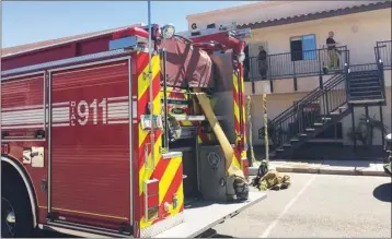  ?? LOANED PHOTO ?? YUMA FIREFIGHTE­RS RESPONDED to an alarm at the Palo Verde Villa Apartments at approximat­ely 1 p.m. Thursday afternoon indicating a fire sprinkler activation inside one of the apartments. The activation was later determined to have been caused by heat...