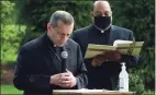  ?? Erik Trautmann / Hearst Connecticu­t Media ?? Bishop Caggiano and Rev. Reginald D. Norman lead the ceremony during the dedication of the Philip Tai-Lauria memorial garden at Our Lady of Fatmina Catholic Church in Wilton in August.