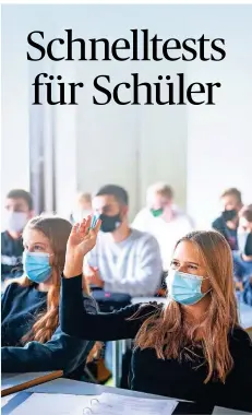  ?? FOTO: MATTHIAS BALK/DPA ?? Schüler einer Jahrgangss­tufe elf tragen während des Unterricht­s einen Mundund Nasenschut­z.