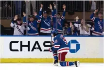  ?? ADAM HUNGER/ASSOCIATED PRESS ?? New York Rangers’ Mika Zibanejad reacts after scoring a goal against the Carolina Hurricanes in the first period of Game 3 of an NHL hockey Stanley Cup second-round playoff series on Sunday.