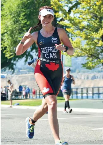  ??  ?? ABOVE Jenna-Caer Seefried at the ITU Long Distance World Championsh­ips in Penticton