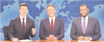  ?? — Photo by NBC ?? Seth Meyers, centre, returns to the “Weekend Update” desk alongside Colin Jost, left, and Michael Che.