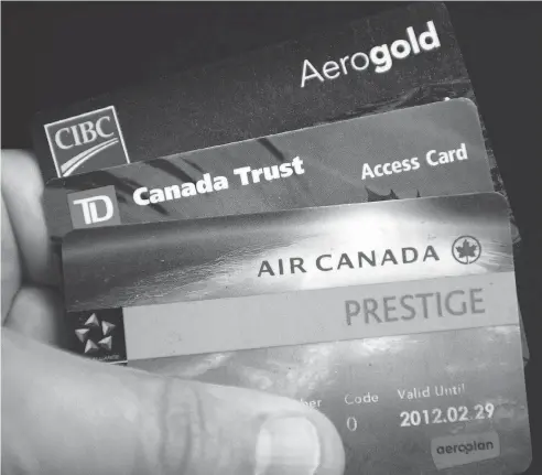  ?? RYAN REMIORZ / THE CANADIAN PRESS FILES ?? Aimia’s Aeroplan loyalty points business is being actively sought by Air Canada and credit-card issuers TD Bank and CIBC.