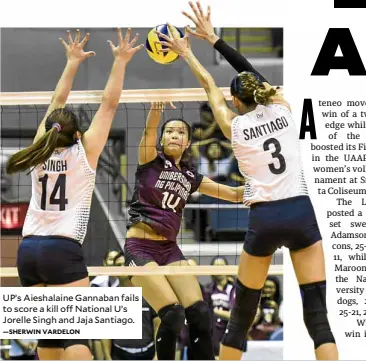  ?? —SHERWIN VARDELON ?? UP’s Aieshalain­e Gannaban fails to score a kill off National U’s Jorelle Singh and Jaja Santiago.