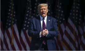  ?? Photograph: Christophe­r Dolan/AP ?? Donald Trump arrives to speak to a crowd of supporters at Mariotti Building Products in Pennsylvan­ia on 20 August.