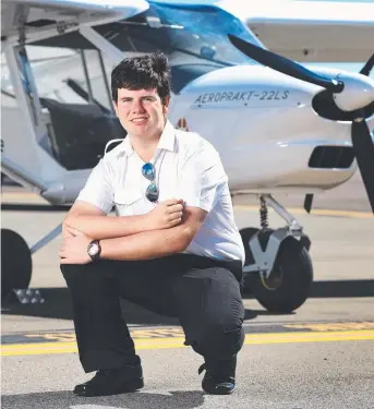  ?? FLYING HIGH: Year 12 student at Townsville High School Ciaran Barker has just been awarded his pilot certificat­e. Picture: ZAK SIMMONDS ??