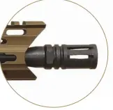  ??  ?? An A2 flash hider comes standard. The author would rather replace this with a supressor.