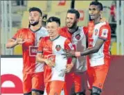  ?? ISL ?? FC Goa players celebrate a goal against FC Pune City.