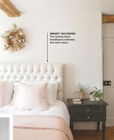  ??  ?? SMART TAILORING THE BUTTON-BACK HEADBOARD MATCHES THE WALL COLOUR