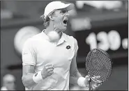  ?? AP/GLYN KIRK ?? Kevin Anderson celebrates winning a point from John Isner during their Wimbledon men’s singles semifinal match Friday in London. Anderson won the longest Centre Court match in history, edging Isner 7-6 (6), 6-7 (5), 6-7 (9), 6-4, 26-24 in a match that lasted more than 6½ hours.