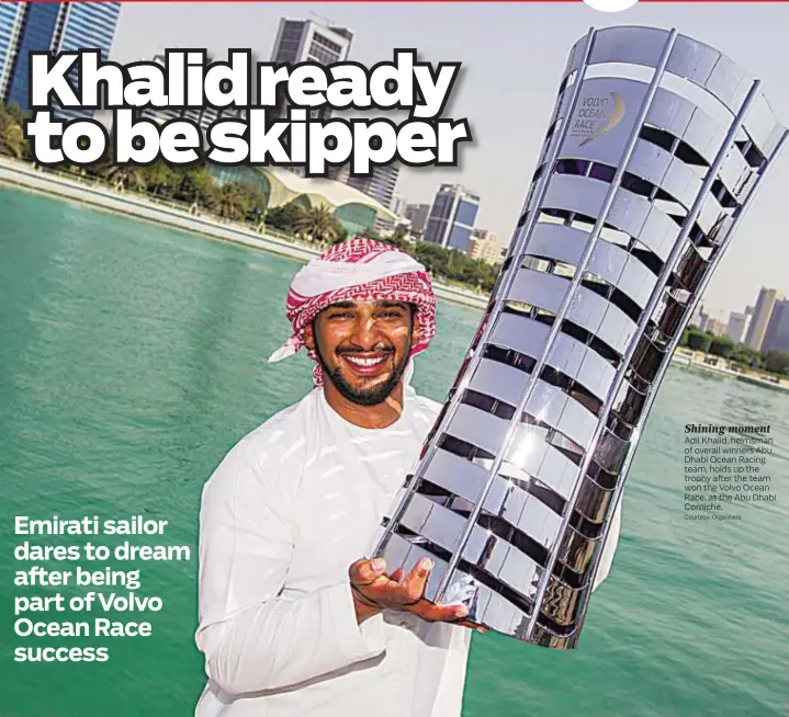  ?? Courtesy: Organisers ?? Shining moment Adil Khalid, helmsman of overall winners Abu Dhabi Ocean Racing team, holds up the trophy after the team won the Volvo Ocean Race, at the Abu Dhabi Corniche.