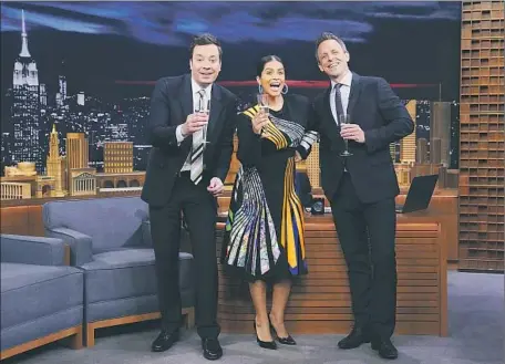  ?? Andrew Lipovsky NBC ?? NBC’S LATE- NIGHT hosting cabal gathers for a cheery toast: Jimmy Fallon, left, newcomer Lilly Singh and Seth Meyers.