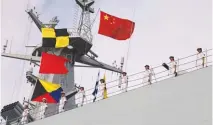  ?? REUTERSPIX ?? Sailors stand on a ship sailing off from a military port in Zhanjiang for Djibouti on Tuesday.