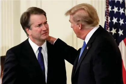  ?? Photograph: Evan Vucci/ AP ?? President Donald Trump greets Brett Kavanaugh, his supreme court nominee, at the White House on 9 July 2018.