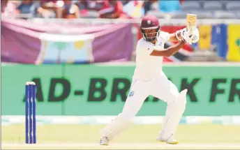  ?? ?? West Indies captain Kraigg Brathwaite on the go on the way to his 11th Test hundred on day four of the opening Test in Perth yesterday. (Photo Twitter)