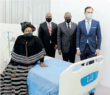  ?? Pictures: WERNER HILLS ?? JOB DONE: At the official handover of the Bay field hospital are, from left, the Rev Dr Elizabeth Mamisa Chabula-Nxiweni, Eastern Cape premier Oscar Mabuyane, health minister Zweli Mkhize and VWSA managing director Thomas Schaefer