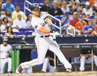  ?? Wilfredo Lee / Associated Press ?? Reigning NL MVP Giancarlo Stanton’s expected trade to the Yankees reminds Register reporter Chip Malafronte of when the Yankees acquired Alex Rodriguez.