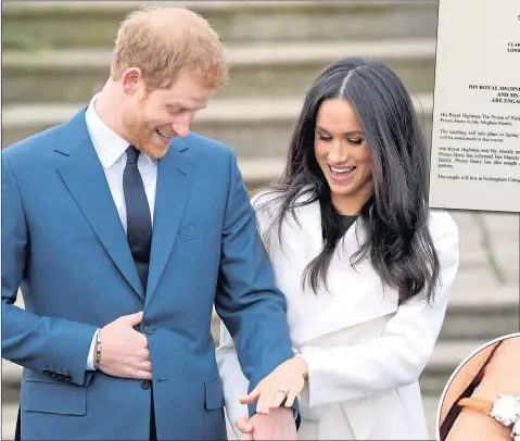  ??  ?? Prince Charles’s letter announcing engagement, above. Loved-up Harry and Meghan admire the £200k ring, inset, that Prince designed for his fiancee