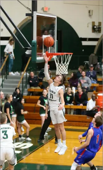  ?? MARK KEMPTON — FOR THE MORNING JOURNAL ?? Connor Trockley shoots a layup during a game against Bay on Jan. 17.