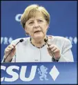  ?? MATTHIAS BALK / DPA ?? German Chancellor Angela Merkel speaks during a campaign event in Munich, Germany, on Sunday.