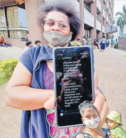  ?? Picture: SOPHIE RALULU ?? Kanisa Tikarukaru, 61, shows the message she received yesterday morning from Lyndhurst chief executive officer Rokoseru Nabalarua. Ms Tikarukaru was with staff members of Lyndhurst that went to lodge a complaint at the Employment Ministry office at Civic House in Suva yesterday.