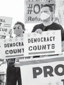  ?? Mark Mulligan / Staff photograph­er ?? Demonstrat­ors hold a rally demanding elections officials “count every vote” in the presidenti­al election during a protest Nov. 4. at Eleanor Tinsley Park.