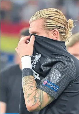  ?? P. ellis / afp ?? Karius no sabe dónde meterse tras el final en Kiev