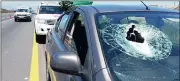  ??  ?? DAMAGED: A pedestrian threw a rock through the window of a vehicle on the N2 just before the R300 off-ramp.