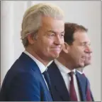  ?? The Associated Press ?? Anti-immigrant leader Geert Wilders, front, and Labour Party leader Lodewijk Asscher arrive for a meeting of Dutch party leaders with the chairwoman of parliament to discuss the first steps in forming a new coalition government.