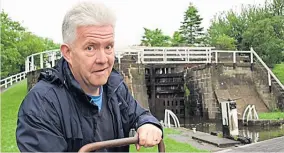  ?? PHOTO: CRT ?? Poet and broadcaste­r Ian McMillan at the Bingley Five Rise Locks.