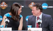  ?? DAVID J. PHILLIP/AP PHOTO ?? Rebecca Lobo talks to Kansas coach Bill Self on Saturday during the Basketball Hall of Fame news conference in Glendale, Ariz.