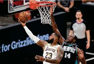  ?? Wade Payne / Associated Press ?? Gorgui Dieng, blocking Lebron James earlier in the season, has started 205 games in his eight NBA seasons. But he said he’ll be content if he doesn’t add to that total while with the Spurs.