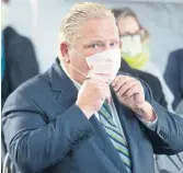  ?? CHRIS YOUNG THE CANADIAN PRESS ?? Ontario Premier Doug Ford is defending the government’s move to hand out almost $1 billion in COVID-19 relief to businesses that did not qualify.