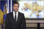  ?? UKRAINIAN PRESIDENTI­AL PRESS OFFICE VIA AP, FILE ?? In this photo taken from video provided by the Ukrainian Presidenti­al Press Office, Ukrainian President Volodymyr Zelenskyy addresses the nation in Kyiv, Ukraine, Feb. 24, 2022.